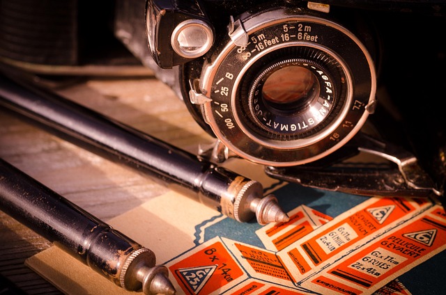 Close-up of a vintage film camera, symbolizing raw filmmaking techniques.